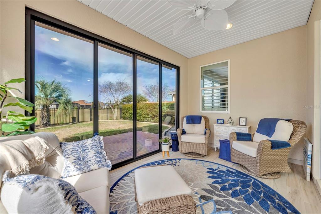 115 Bayou Bend Road Groveland, FL 34736 - Photo 21 of 47 a living room with couch and a large window