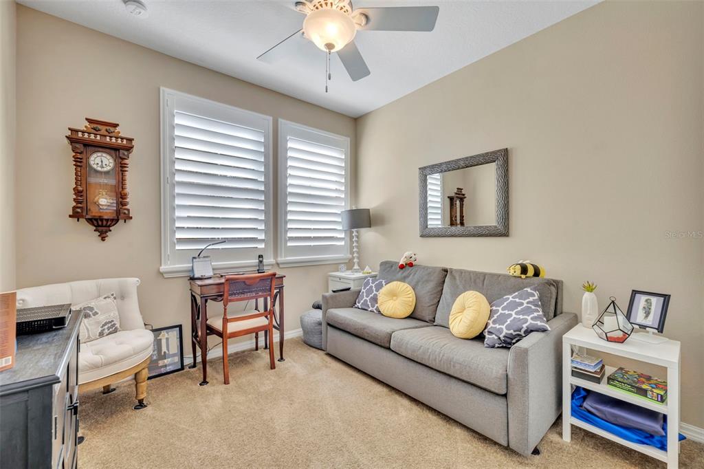 115 Bayou Bend Road Groveland, FL 34736 - Photo 28 of 47 a living room with furniture and a window