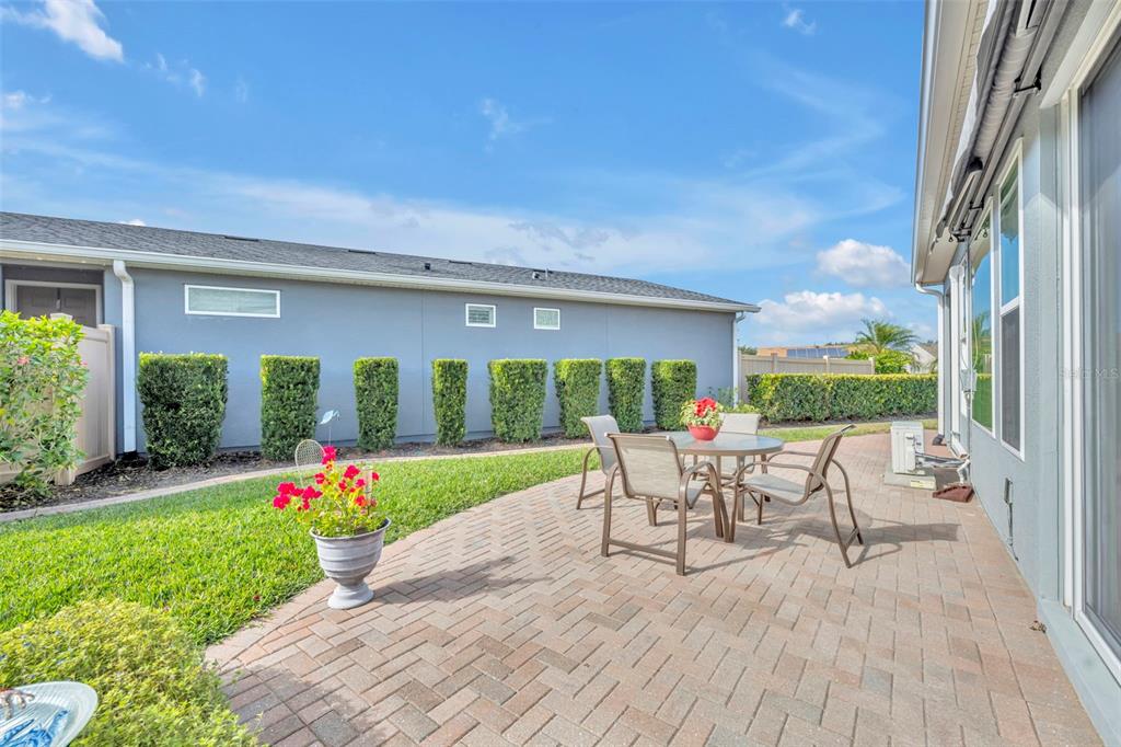 115 Bayou Bend Road Groveland, FL 34736 - Photo 31 of 47 a garden view with a seating space
