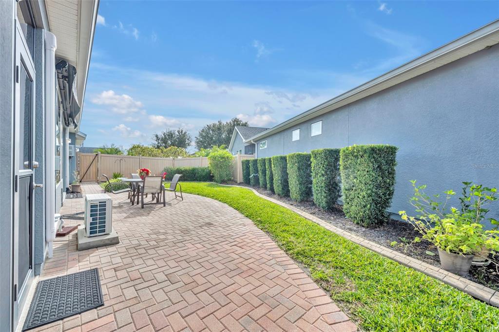 115 Bayou Bend Road Groveland, FL 34736 - Photo 33 of 47 a view of a porch with furniture
