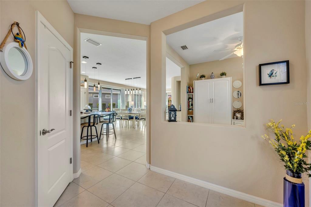 115 Bayou Bend Road Groveland, FL 34736 - Photo 5 of 47 a view of livingroom with furniture and entryway