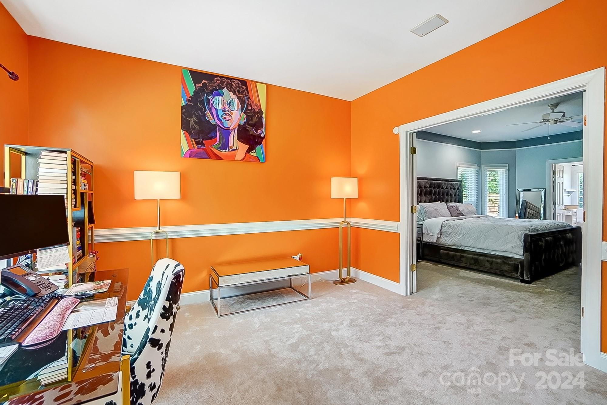 814 Pine Forest Road Charlotte, NC 28214 - Photo 16 of 26 a bedroom with furniture and a flat screen tv