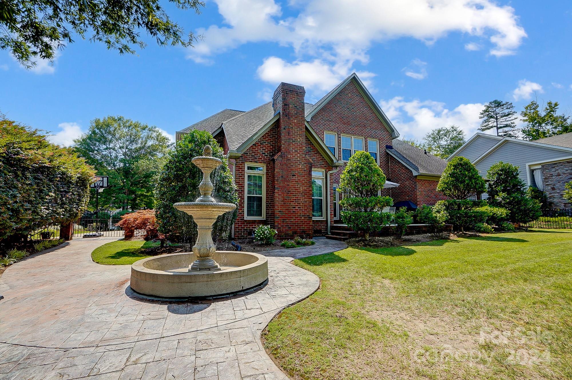 814 Pine Forest Road Charlotte, NC 28214 - Photo 25 of 26 a front view of a house with swimming pool garden and fire pit