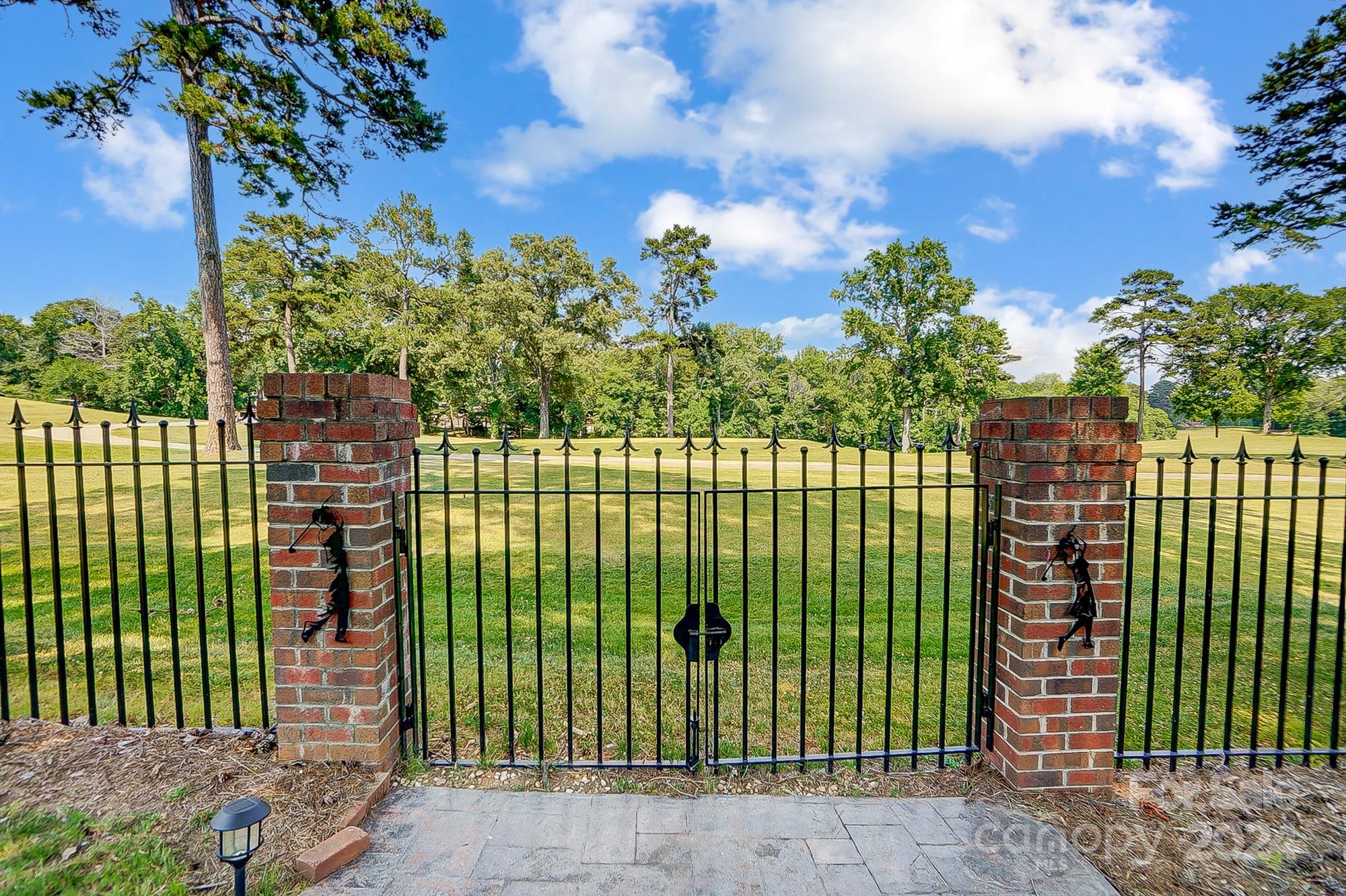 814 Pine Forest Road Charlotte, NC 28214 - Photo 26 of 26 a view of a house with a garden and plants