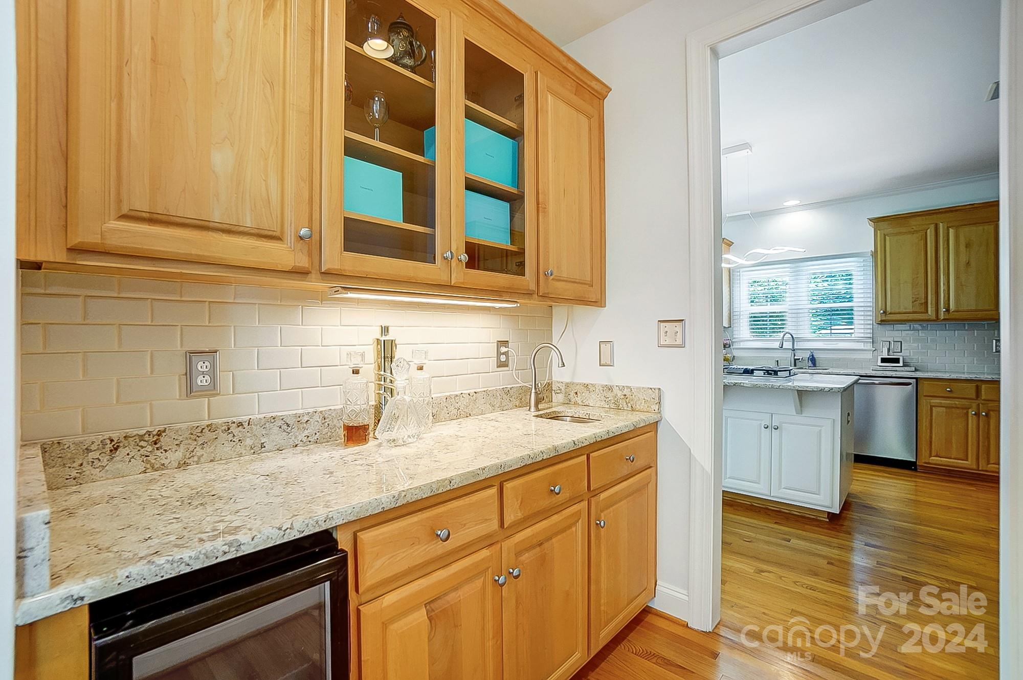 814 Pine Forest Road Charlotte, NC 28214 - Photo 8 of 26 a kitchen with stainless steel appliances granite countertop a sink and cabinets