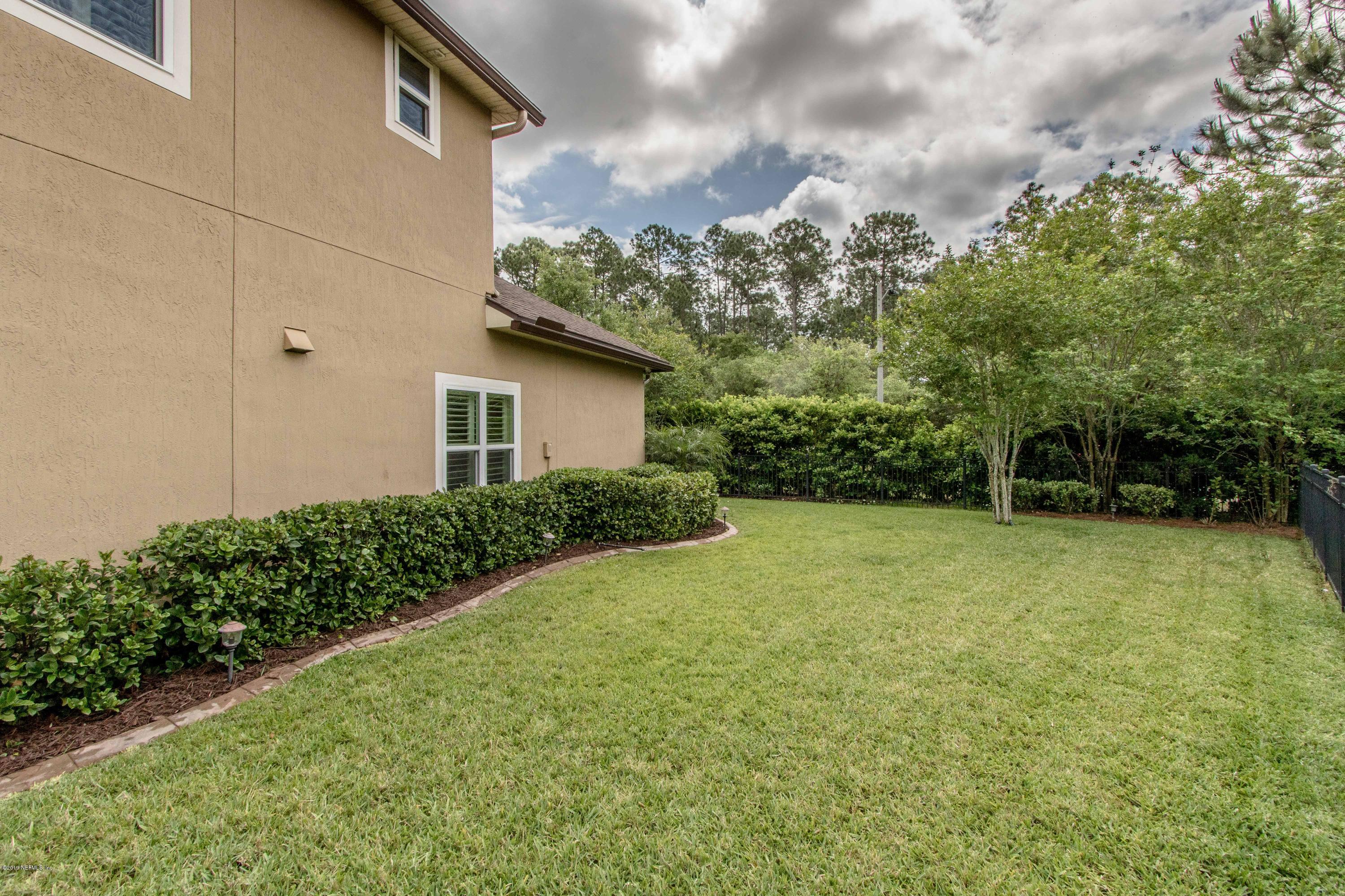 1801 Sugar Maple Road Fleming Island, FL 32003 - Photo 41 of 55 Side Yard View 2