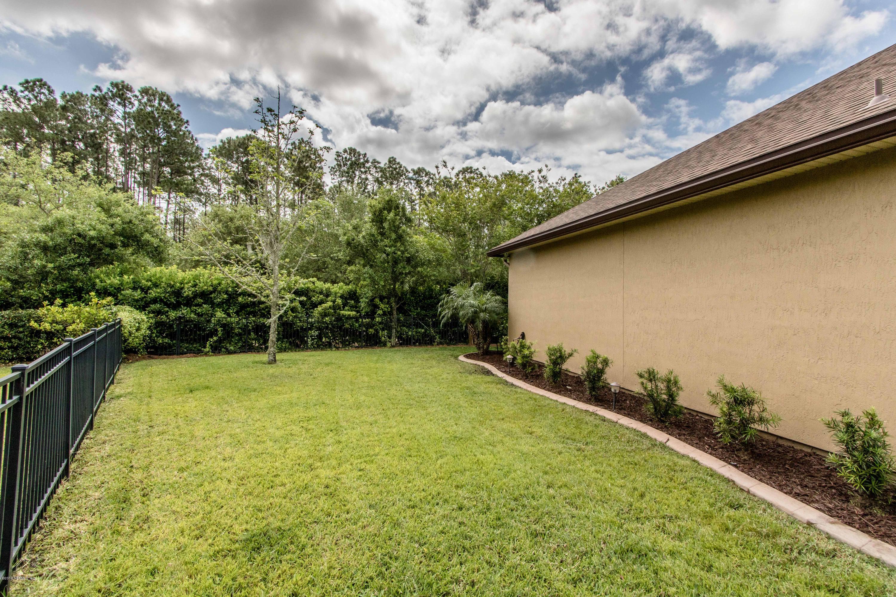 1801 Sugar Maple Road Fleming Island, FL 32003 - Photo 42 of 55 Side Yard View 3