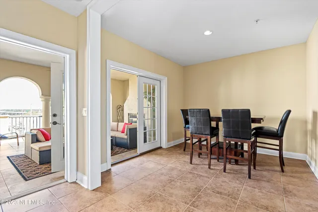 a view of a livingroom with furniture and front door