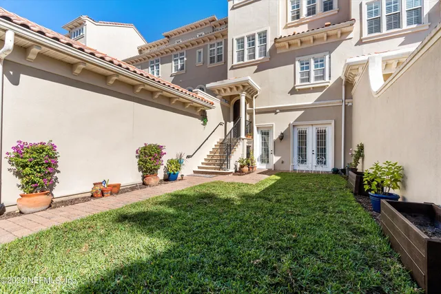 a view of a house with a garden