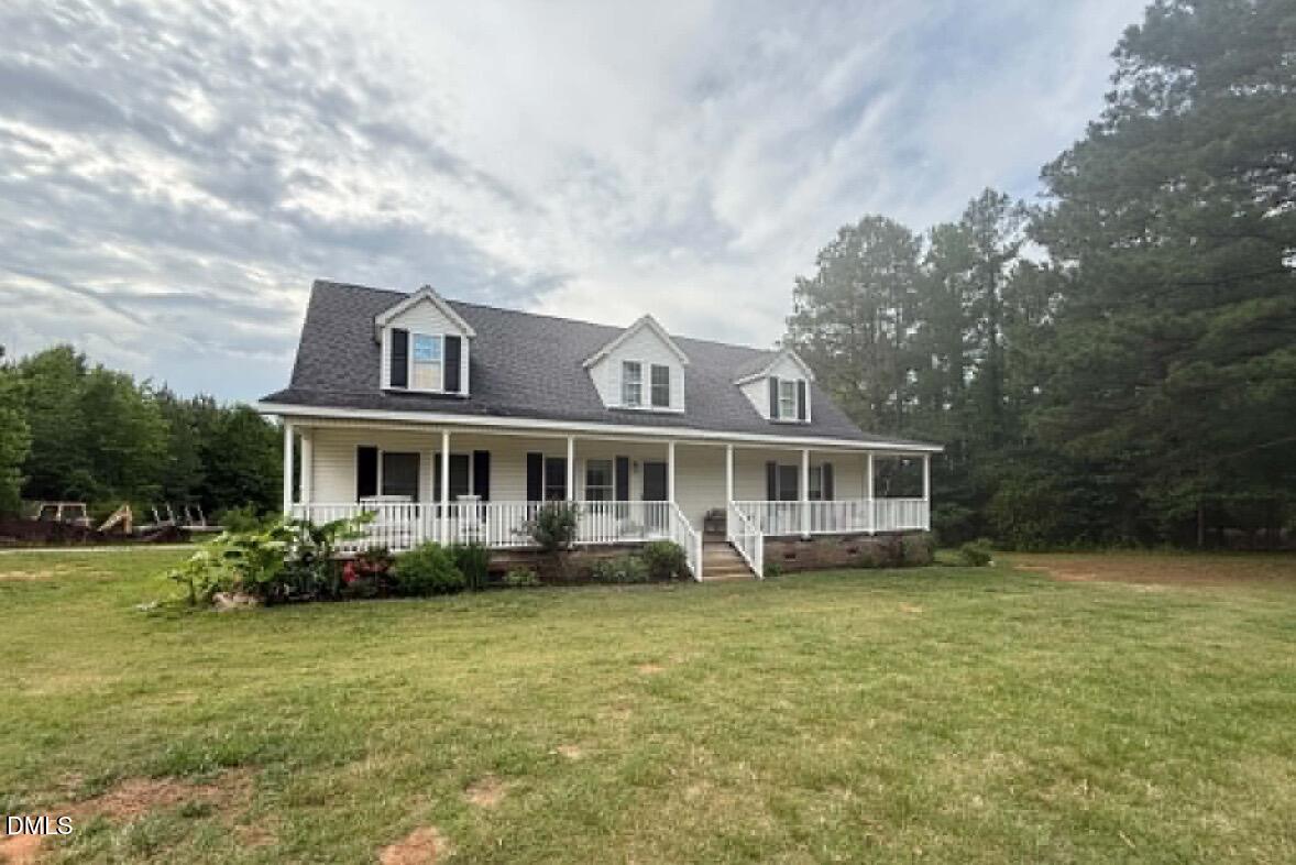 344 J B Leonard Road Castalia, NC 27816 - Photo 16 of 32 a front view of house with yard and trees around