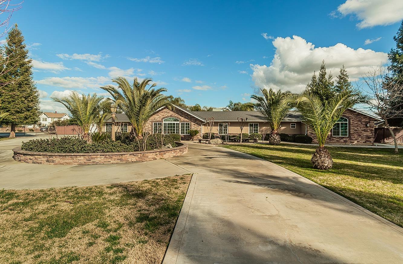 7010 South Frankwood Avenue Reedley, CA 93654 - Photo 2 of 75 a view of swimming pool with outdoor seating