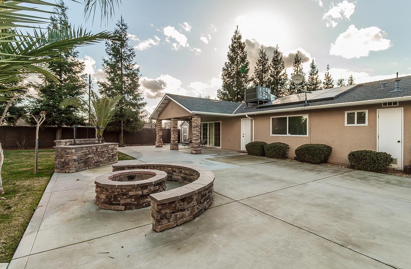 7010 South Frankwood Avenue Reedley, CA 93654 - Photo 46 of 75 a view of a house with backyard and sitting area