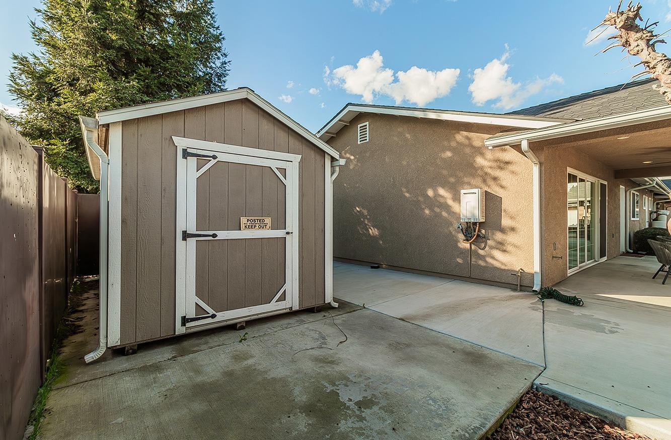 7010 South Frankwood Avenue Reedley, CA 93654 - Photo 52 of 75 a view of a house with a doors