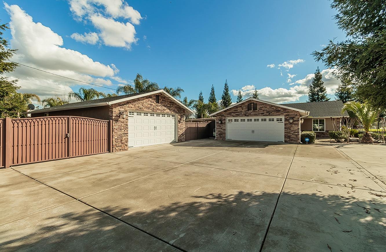 7010 South Frankwood Avenue Reedley, CA 93654 - Photo 63 of 75 a view of a house with a outdoor space