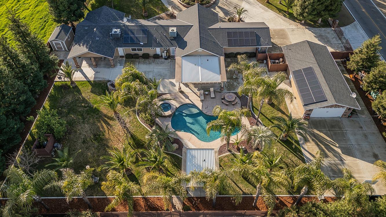 7010 South Frankwood Avenue Reedley, CA 93654 - Photo 70 of 75 an aerial view of a house with a yard
