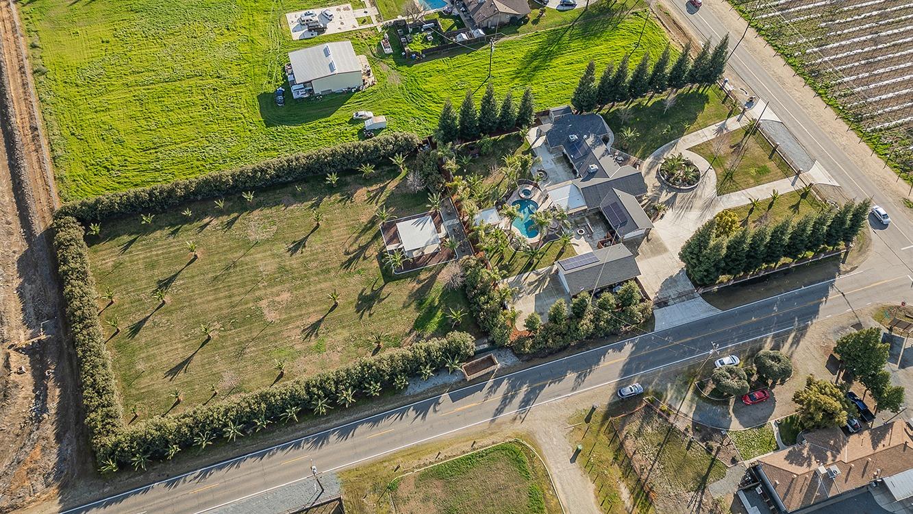 7010 South Frankwood Avenue Reedley, CA 93654 - Photo 72 of 75 a view of swimming pool with a yard
