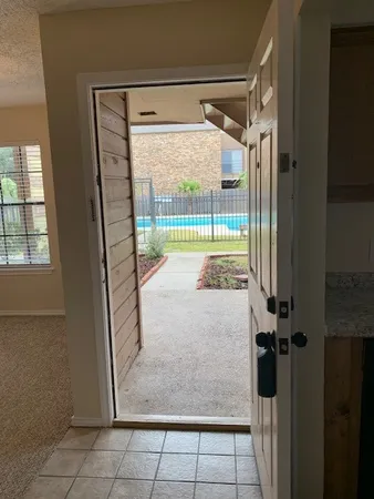 a view of a backyard with a garden