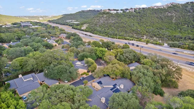 an aerial view of a city with lots of residential buildings