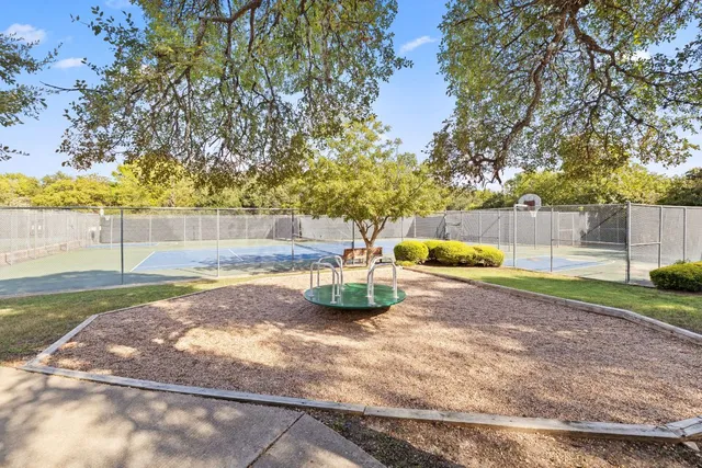a view of backyard with green space