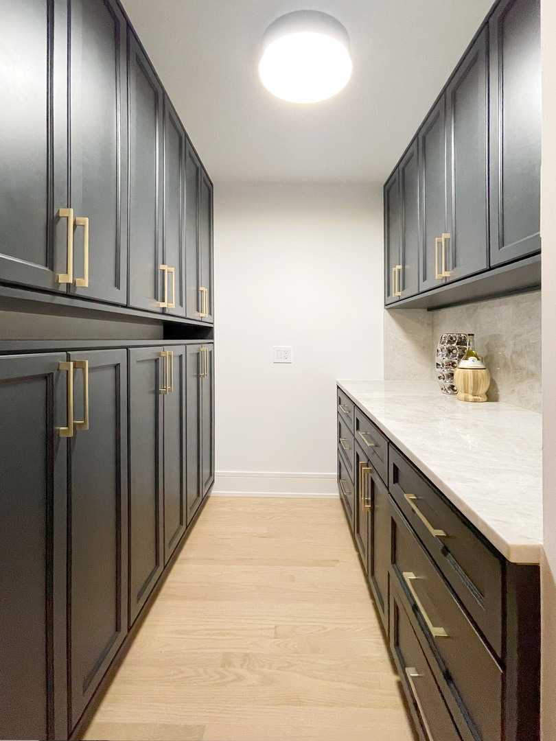 2005 Malory Lane Highland Park, IL 60035 - Photo 13 of 48 a view of a kitchen with wooden floor and cabinets
