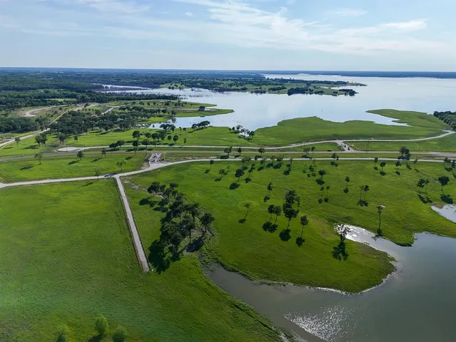 a view of a golf course with a lake