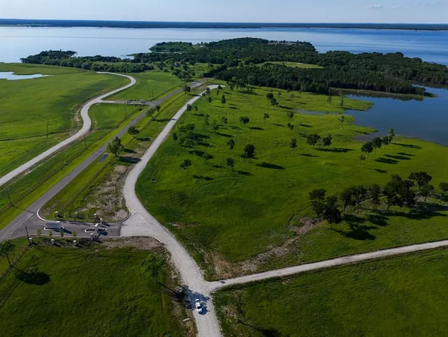 a view of a lake with a city