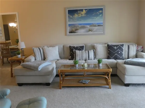 a living room with furniture and a couch