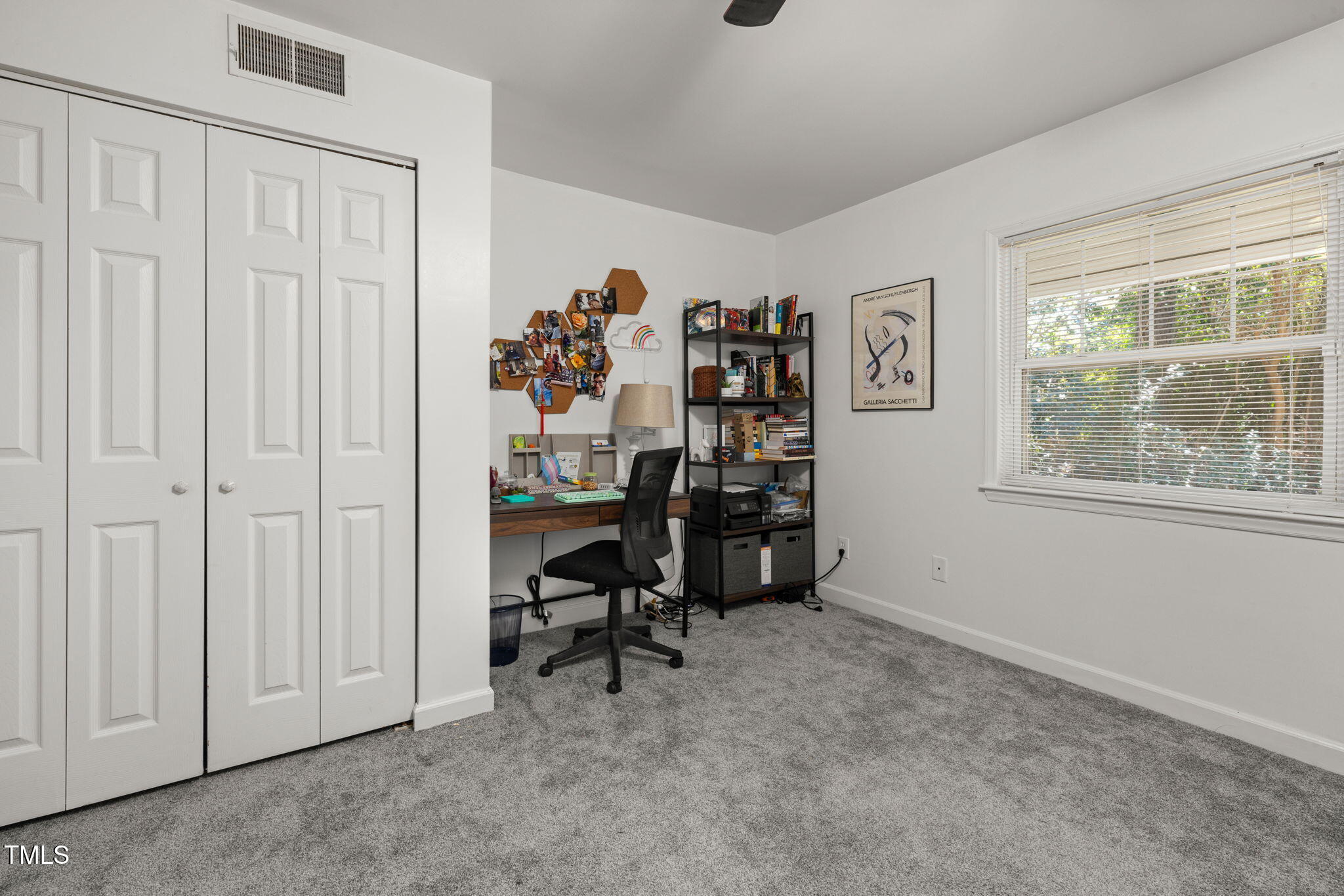 2520 Avent Ferry Road, Unit 103 Raleigh, NC 27606 - Photo 18 of 23 a view of a livingroom with workspace and a window