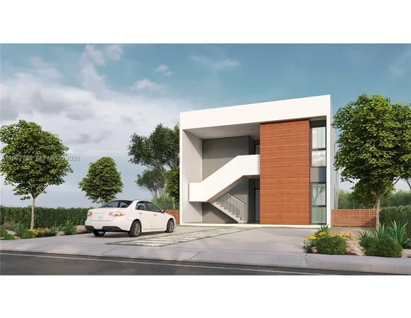 a view of building with car parked