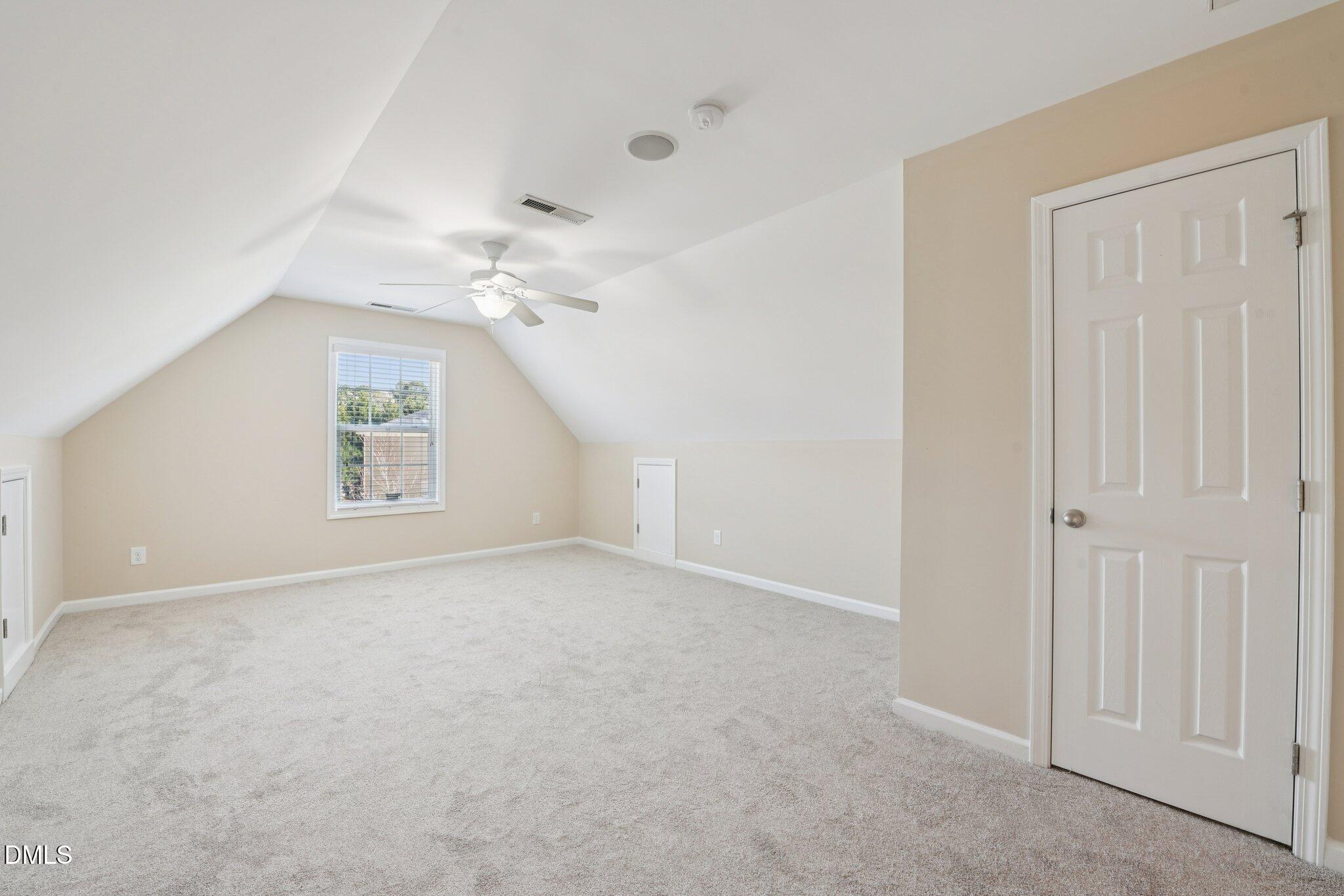 11 Hidden Ridge Court Durham, NC 27707 - Photo 24 of 30 a view of an empty room with a window