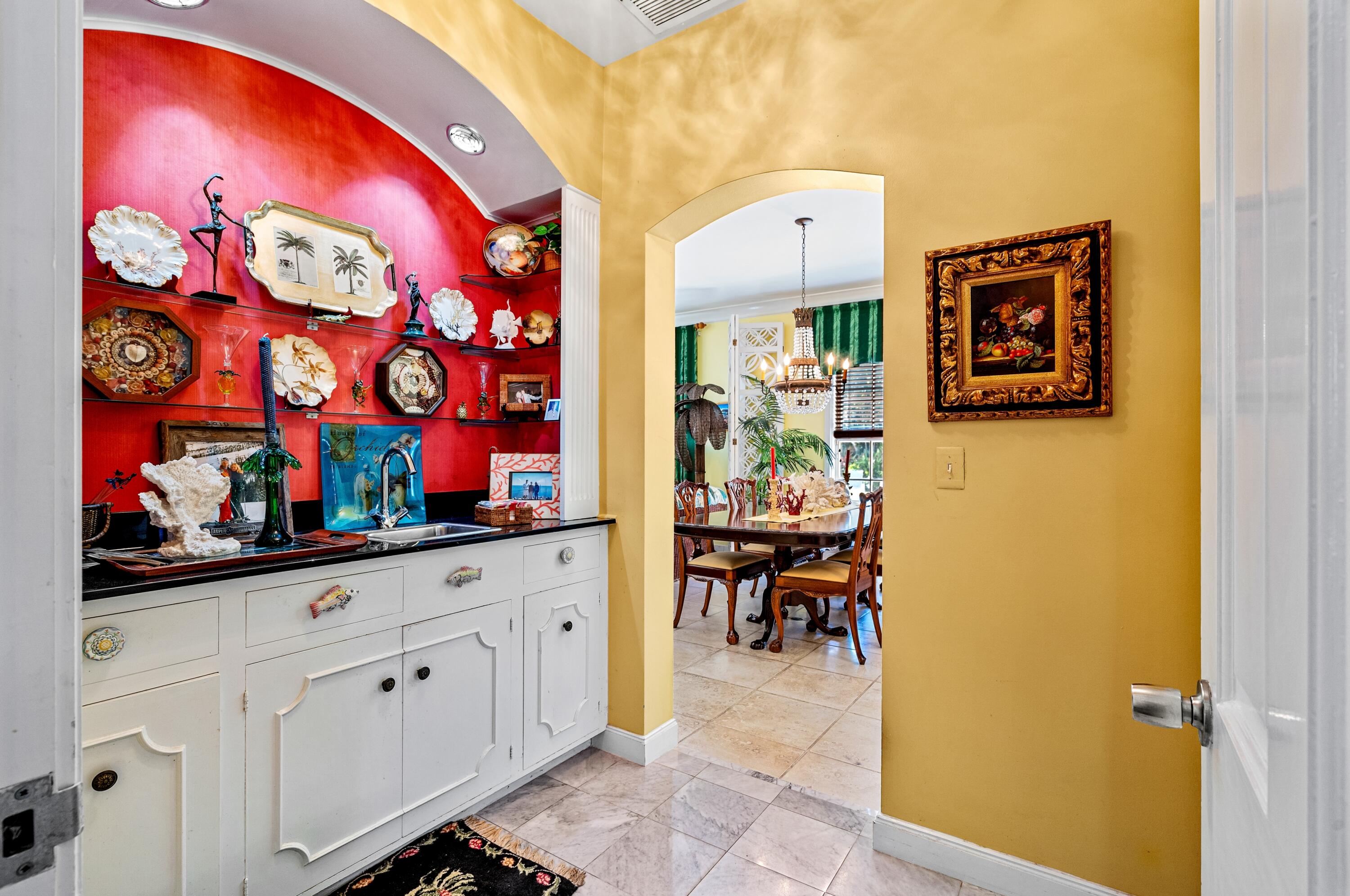 3224 North Ocean Boulevard Gulf Stream, FL 33483 - Photo 18 of 48 an entryway with painting on the wall