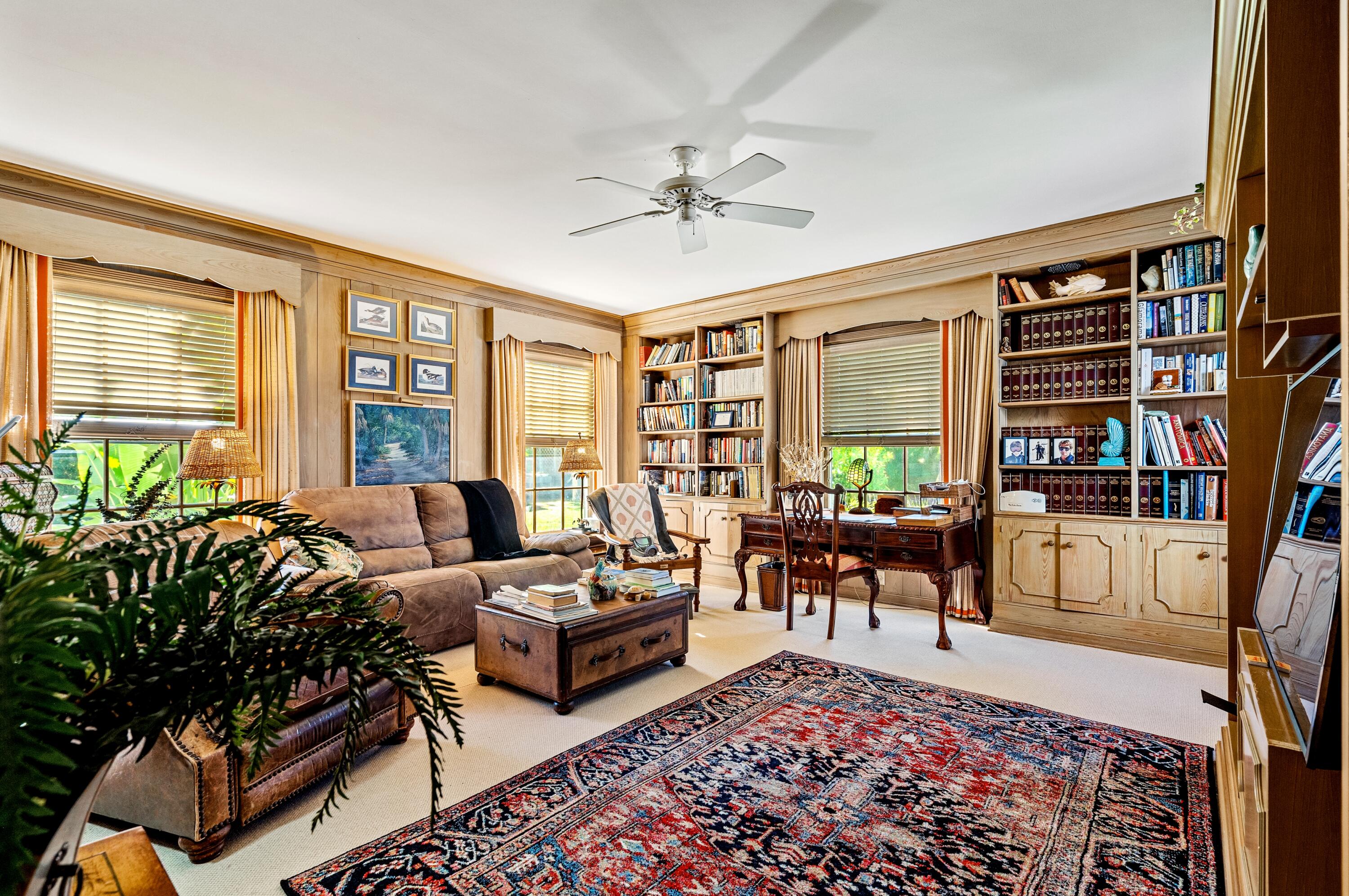 3224 North Ocean Boulevard Gulf Stream, FL 33483 - Photo 26 of 48 a living room with furniture and a potted plant