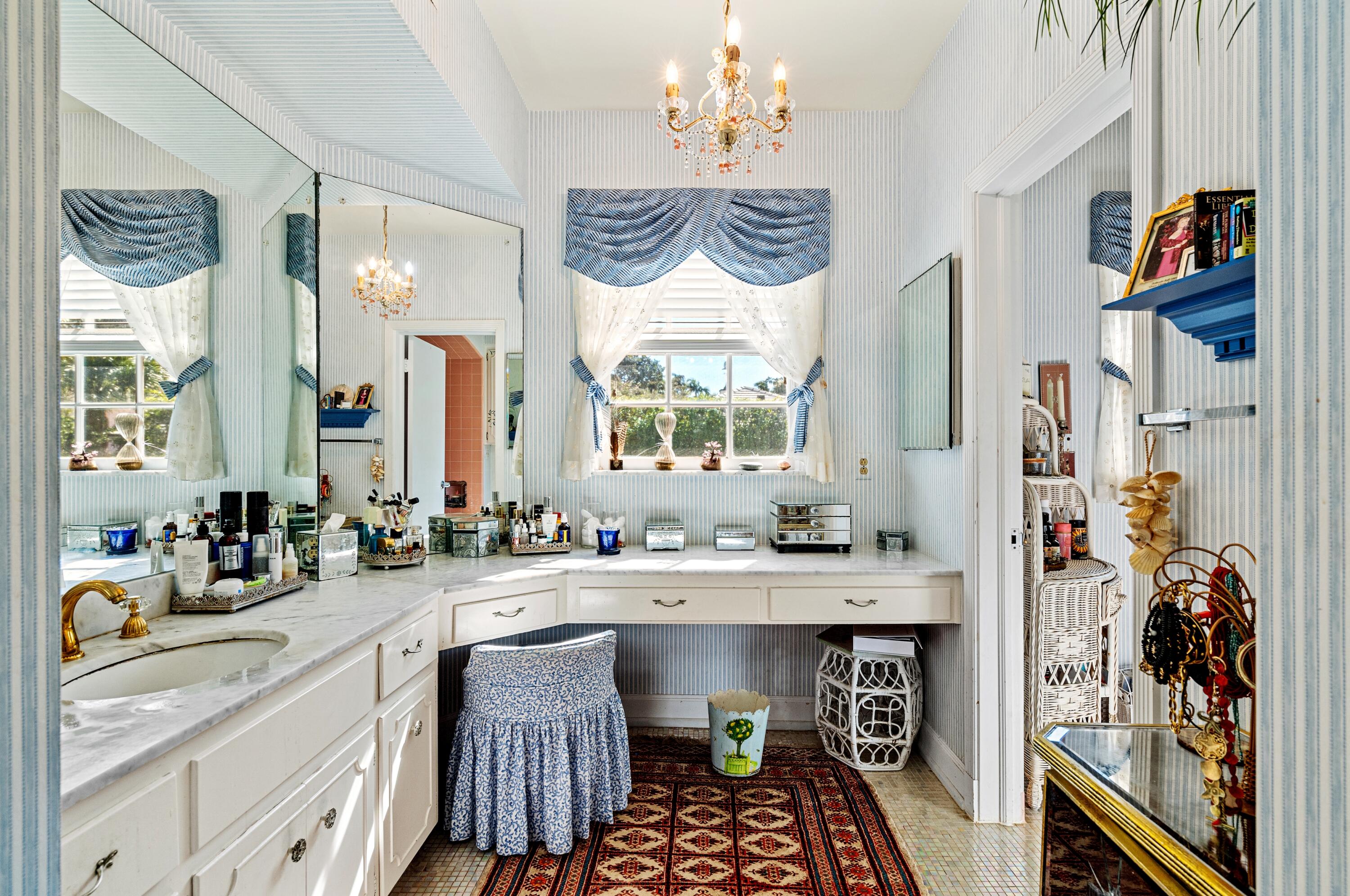 3224 North Ocean Boulevard Gulf Stream, FL 33483 - Photo 31 of 48 a spacious bathroom with a sink double vanity and a mirror