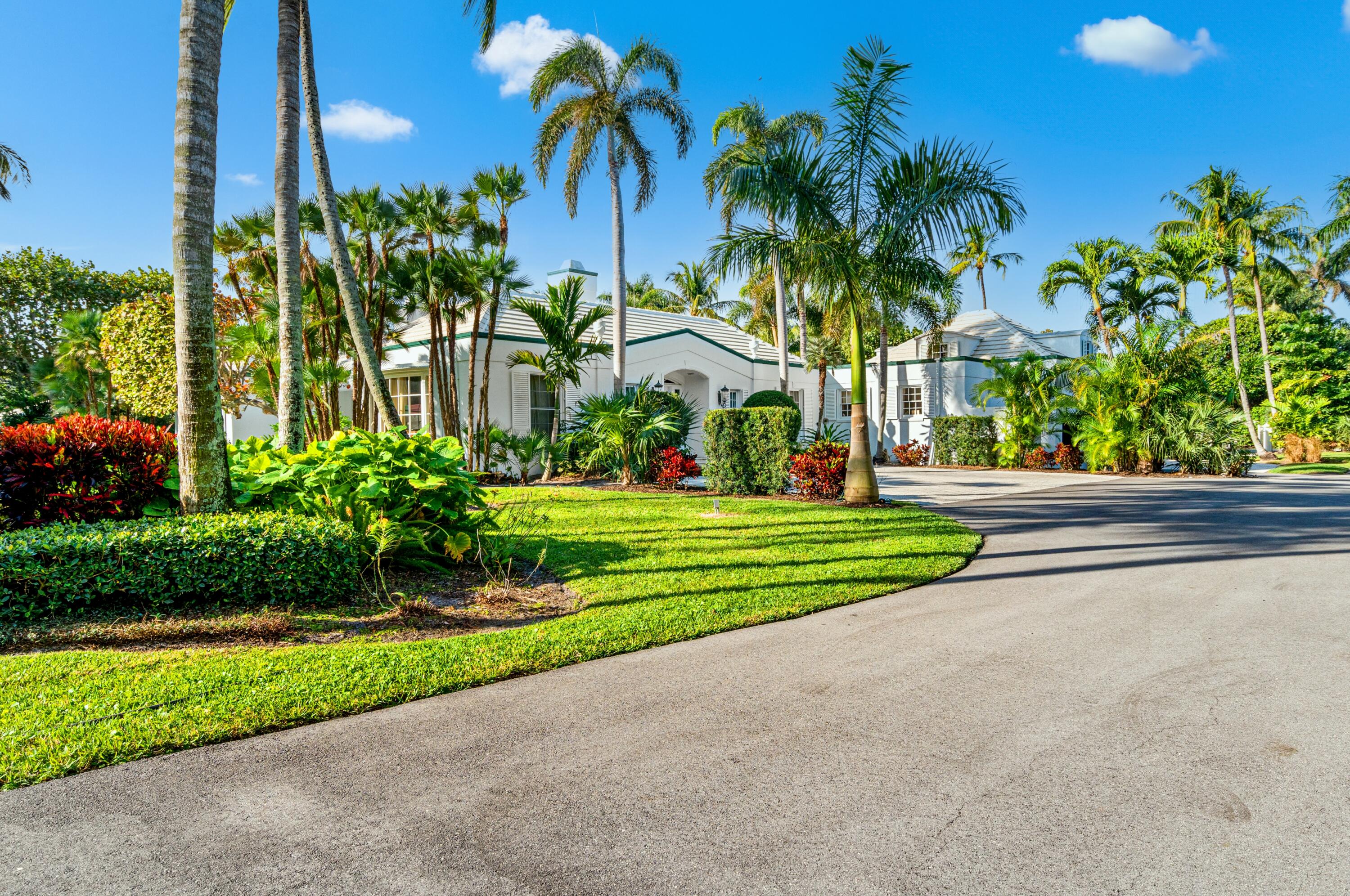 3224 North Ocean Boulevard Gulf Stream, FL 33483 - Photo 4 of 48 a view of street with palm trees