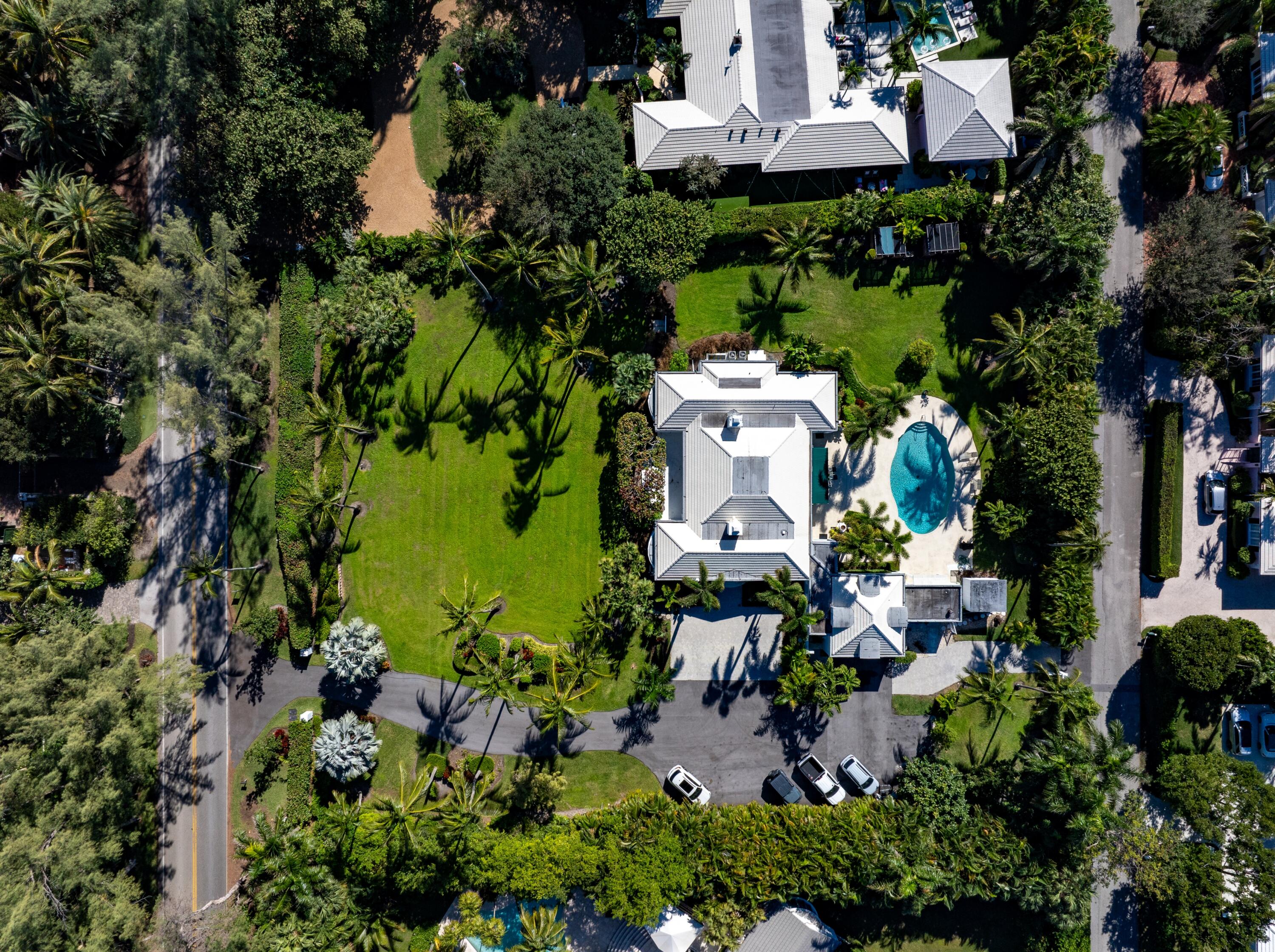 3224 North Ocean Boulevard Gulf Stream, FL 33483 - Photo 48 of 48 an aerial view of a house with a yard and lake view