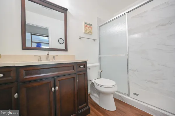 a view of a livingroom with furniture and window