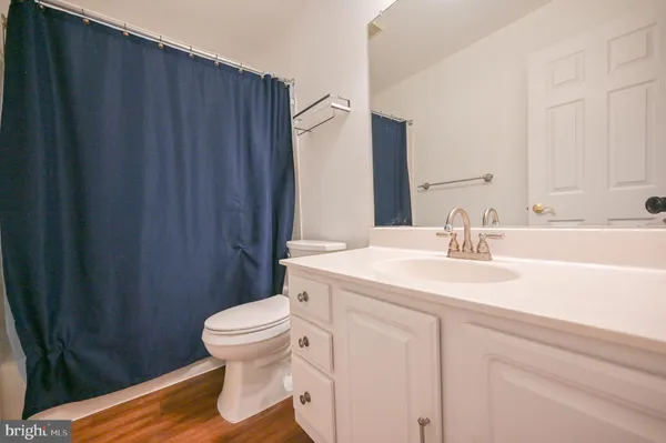 a view of backyard with garden and deck