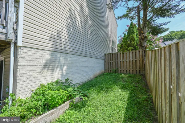 a view of a wooden fence