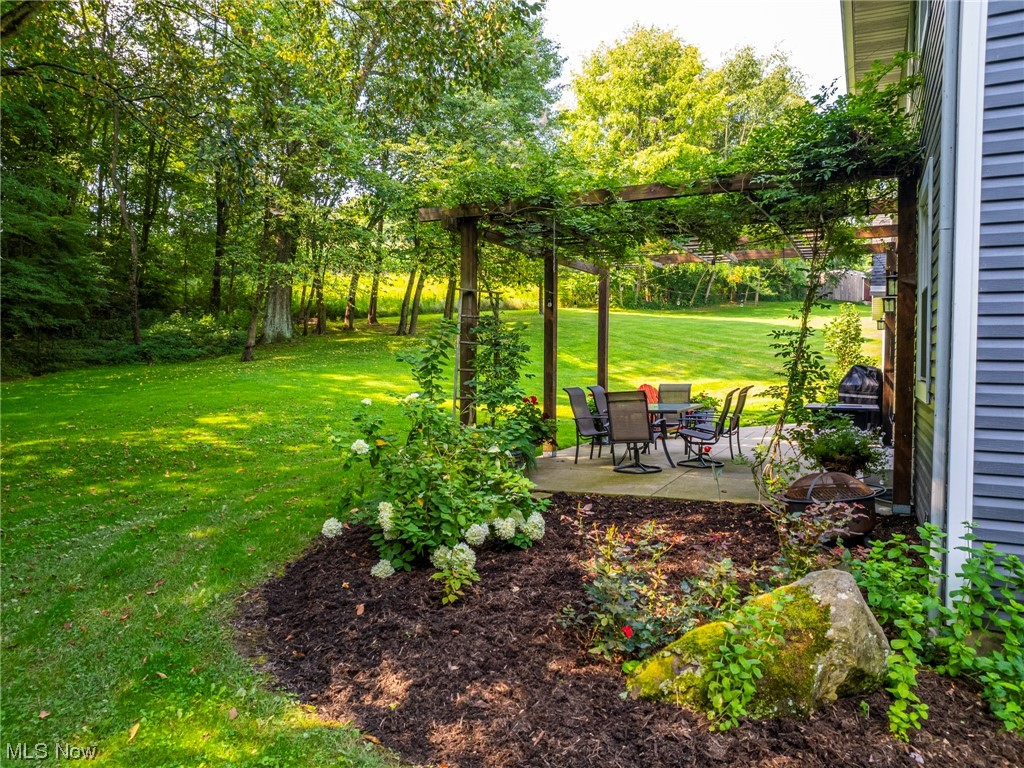 9452 Pleasant Hill Road Northwest Dundee, OH 44624 - Photo 6 of 35 View of yard with a patio