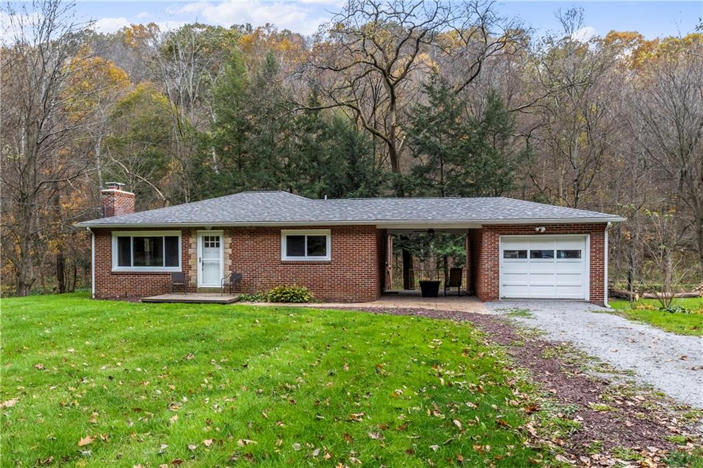 front view of a house with yard