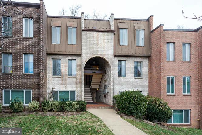 5049 7th Road South, Unit 302 Arlington, VA 22204 - Photo 2 of 26 a front view of a house with large windows