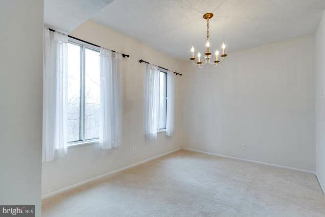 5049 7th Road South, Unit 302 Arlington, VA 22204 - Photo 12 of 26 a view of an empty room with a window