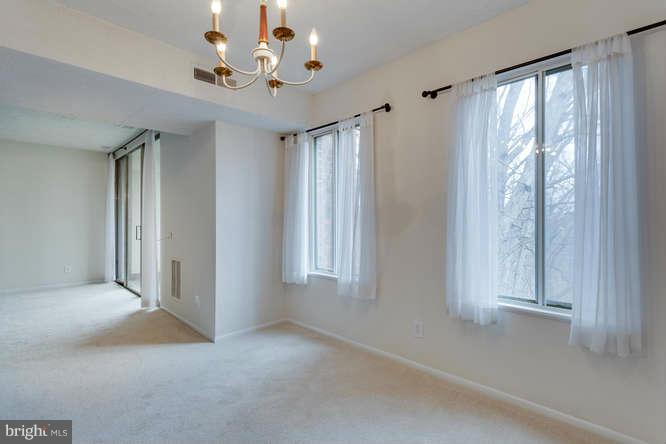 5049 7th Road South, Unit 302 Arlington, VA 22204 - Photo 13 of 26 a view of an empty room with a window
