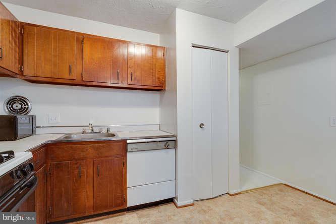 5049 7th Road South, Unit 302 Arlington, VA 22204 - Photo 18 of 26 a room with storage and utility
