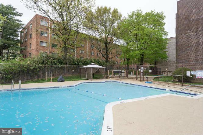 5049 7th Road South, Unit 302 Arlington, VA 22204 - Photo 24 of 26 a view of a swimming pool with a patio
