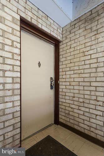 5049 7th Road South, Unit 302 Arlington, VA 22204 - Photo 5 of 26 a view of wooden door