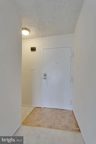 5049 7th Road South, Unit 302 Arlington, VA 22204 - Photo 6 of 26 a view of an empty room
