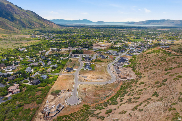 1817 North Dean Court, Unit 12 Alpine, UT 84004 - Photo 27 of 38 Expansive aerial perspective showcasing a developing residential area with paved streets and new home construction