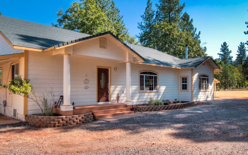 10672 Ridgetop Road Whitmore, CA 96096 - Photo 1 of 20 a front view of a house with a yard