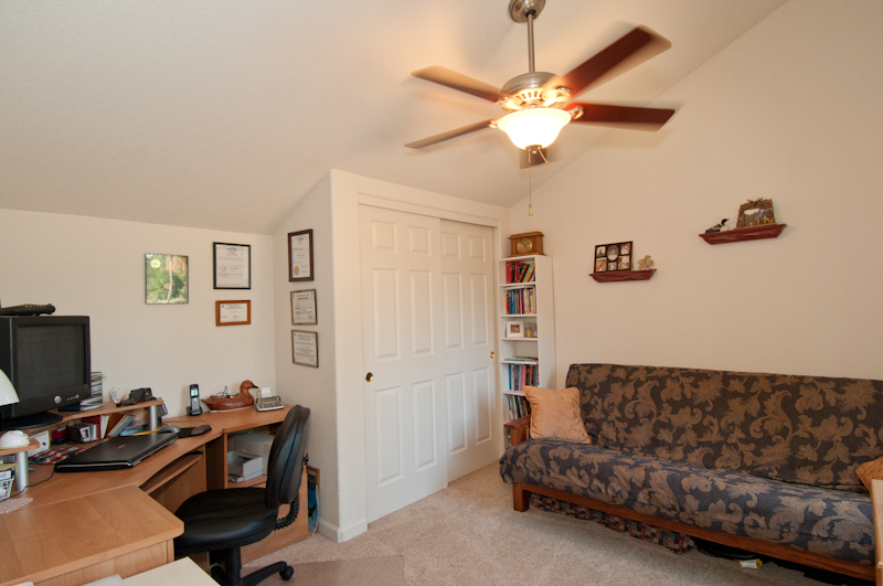 10672 Ridgetop Road Whitmore, CA 96096 - Photo 18 of 20 a view of a livingroom with workspace and a couch